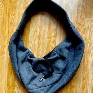 Cat carrier sling bag with collar leash.